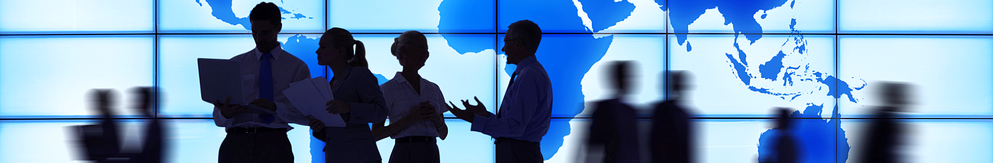 group of people are standing while having a conversation